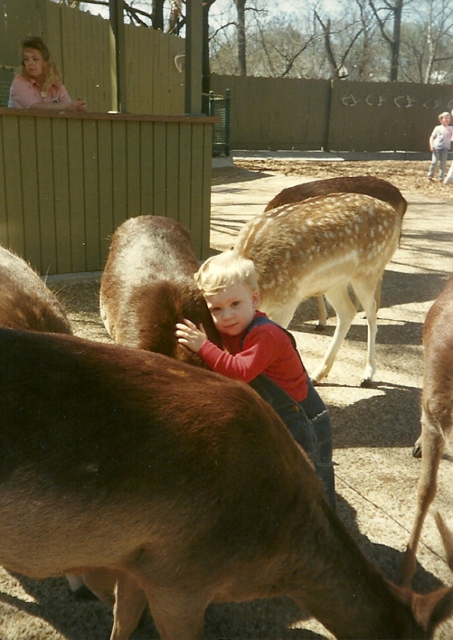 Loving on the deer at Opryland, USA