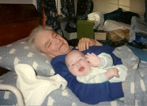 My youngest son snuggling with Paw paw at age 3 months. February 1993